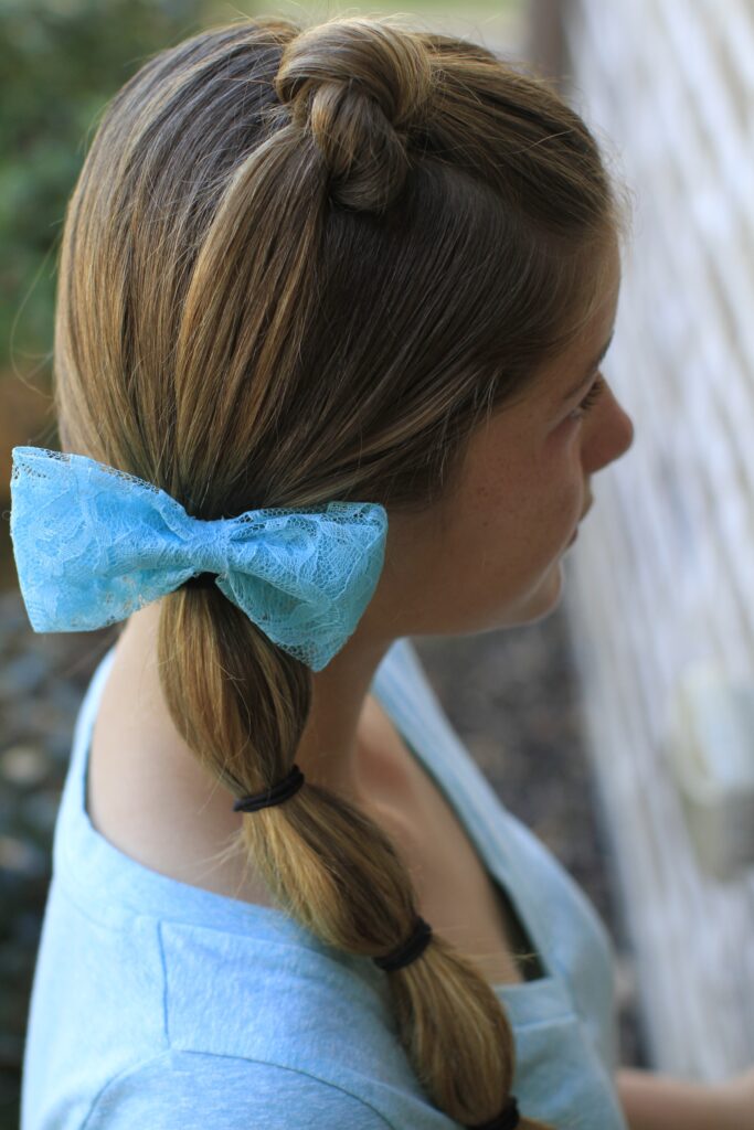 Side view of the Top Knot into Banded Side Ponytail | Cute Hairstyles