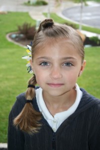 Portrait of young girl modeling the Top Knot Banded Ponytail