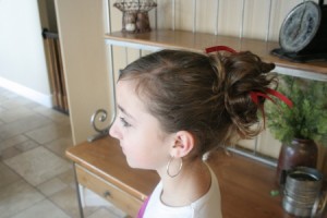 Ribboned Bobby Pins (Side) Side view of the Holiday Messy Bun