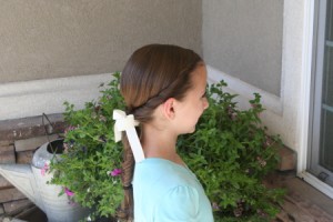 Side view of the Double Twist Ponytail