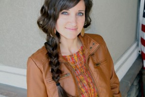 Portrait of woman modeling the Messy Side Braid Hairstyle