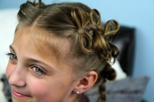 Portrait view of young girl modeling The Bow Braid | Cute Girls Hairstyles