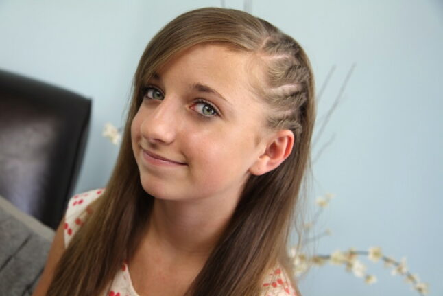 Portrait of a young girl modeling Side Flat Twists | Back-to-School Hairstyles