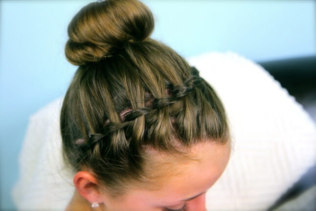 Top side view of the Waterfall Braided Headband into a Bun with Accent Braid.