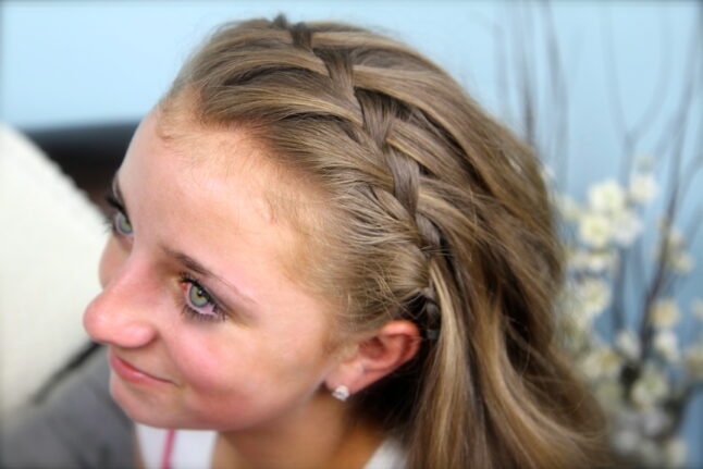 Top side view of the Waterfall Braided Headband with Loose Curls