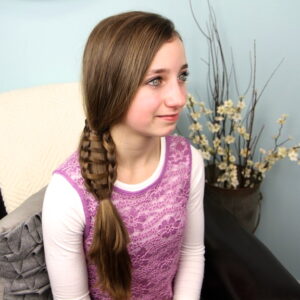 Portrait of a young girl modeling Ladder Braid into Side Ponytail | Cute Hairstyles