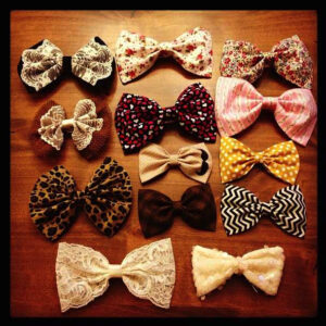 Assorted bows laying on a table | CuteGirls Hairstyles