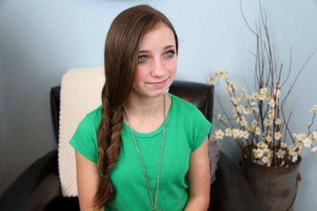 Portrait of young girl modeling Faux Fishtail Braid | Easy Braid Hairstyles