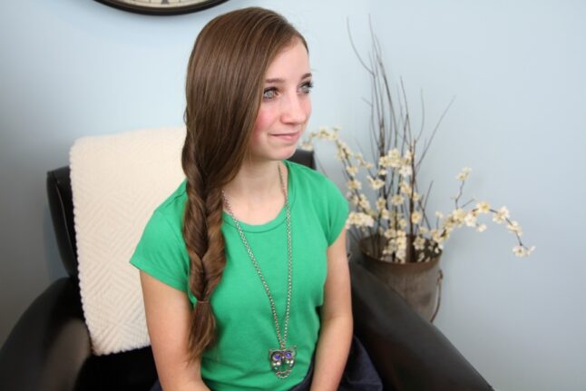 Portrait of young girl modeling Faux Fishtail Braid | Easy Braid Hairstyles