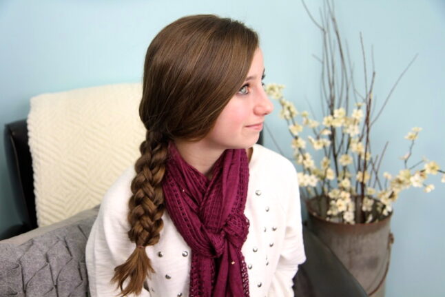 Portrait view of a young girl modeling Stacked Braids | Braid Hairstyles