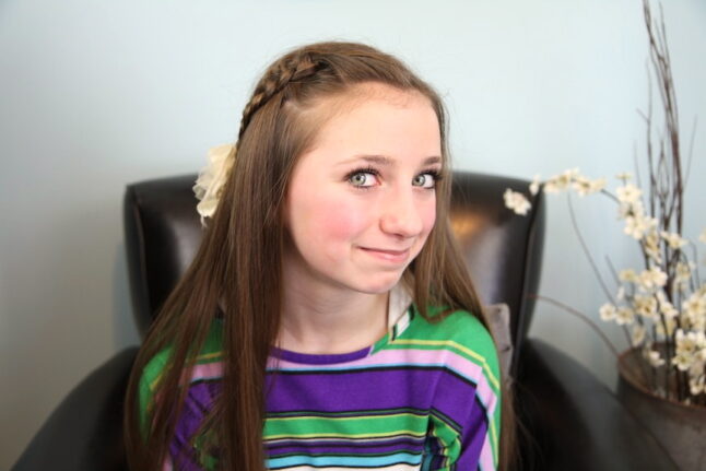 Portrait of a young girl modeling 4-Strand Slide Up Braid | Cute Girls Hairstyles