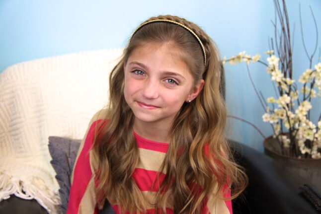 Portrait of young girl modeling Double Braided Sparkle Headband