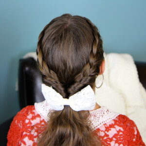 Back view of young girl modeling Lace Braid Twists into Ponytail | Hairstyles for Long Hair