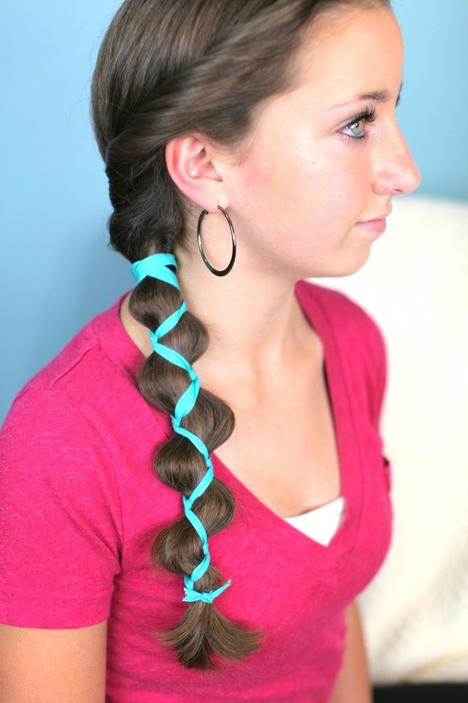 Young girl indoors modeling Ribbon-Accented Loony Braid | Hairstyle Ideas