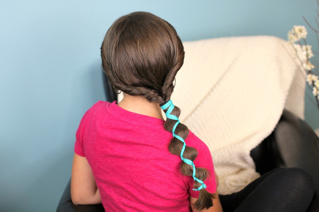 Young girl indoors modeling Ribbon-Accented Loony Braid | Hairstyle Ideas