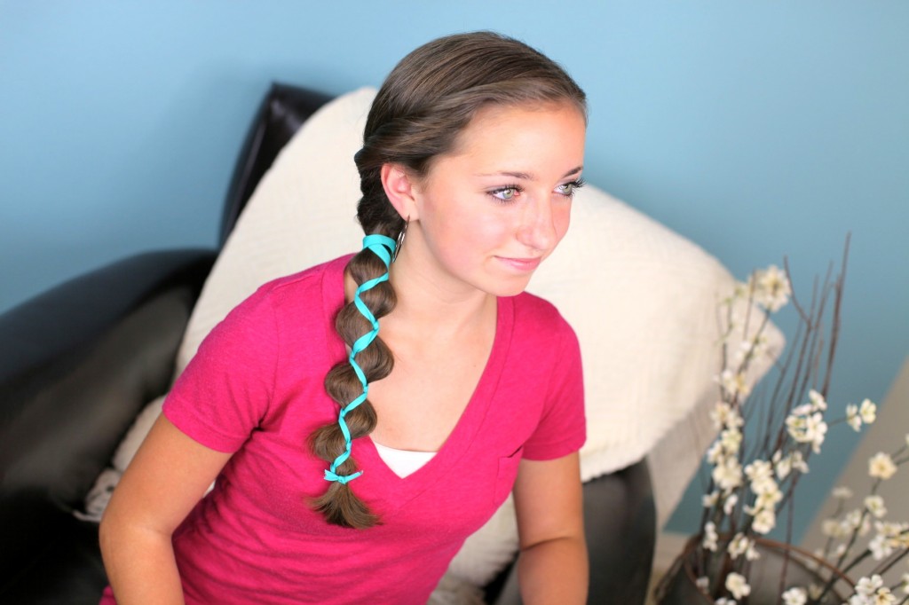 Young girl indoors modeling Ribbon-Accented Loony Braid | Hairstyle Ideas