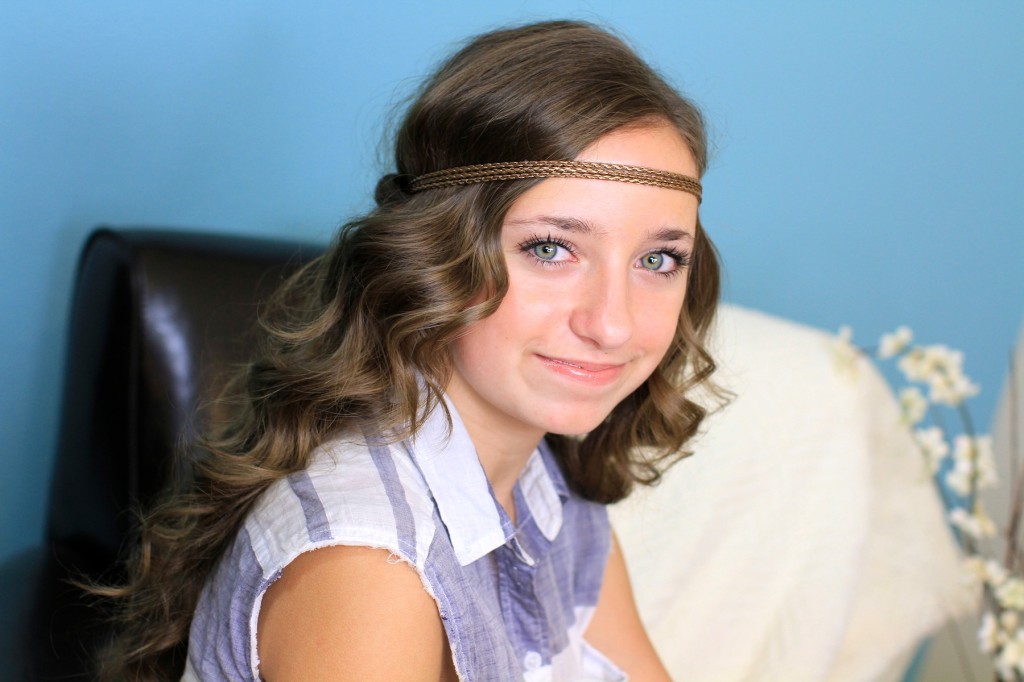 Portrait of a young girl indoors modeling Headband Twist | Half-Up Half Down Hairstyles