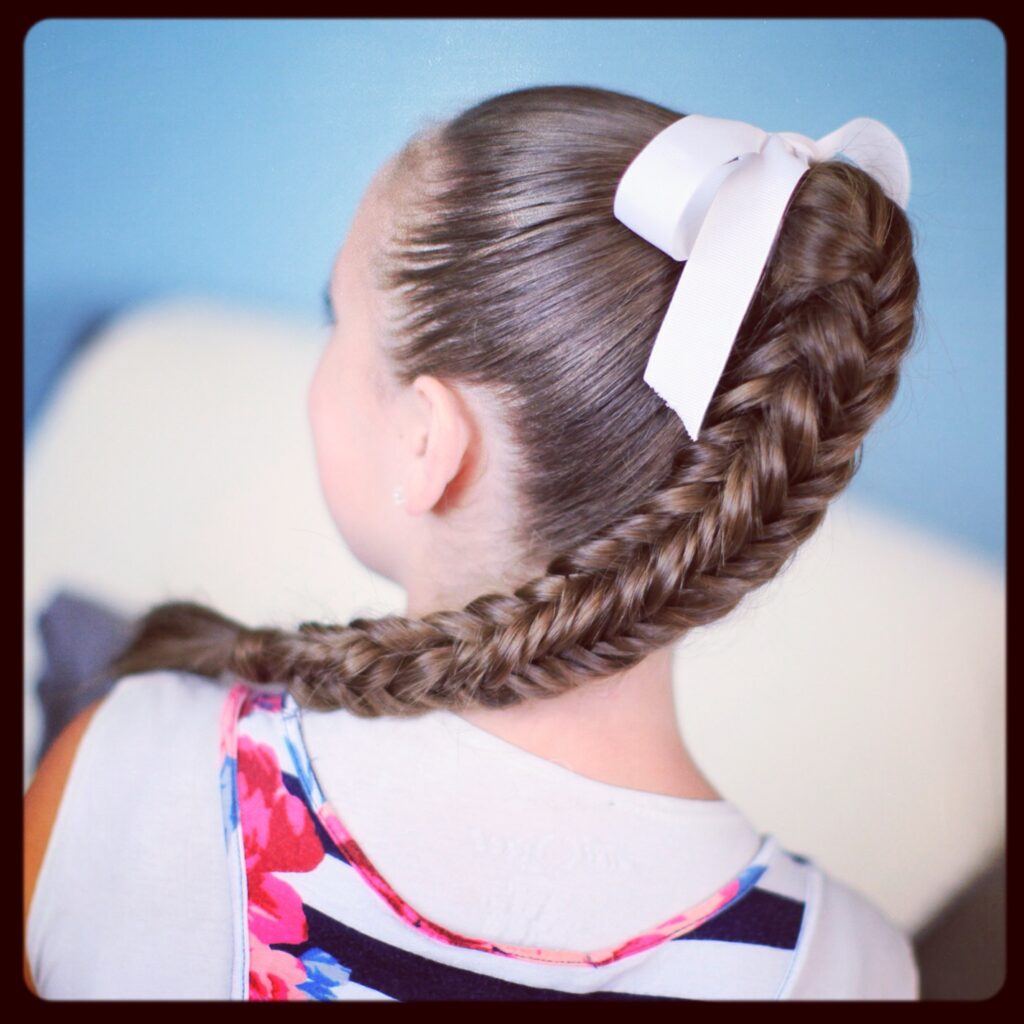 Back view of young girl modeling Box {4-Sided} Fishtail Braid | Cute Braids