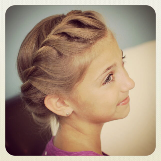 Portrait of young girl modeling Crown Rope Twist Braid | Updo Hairstyles