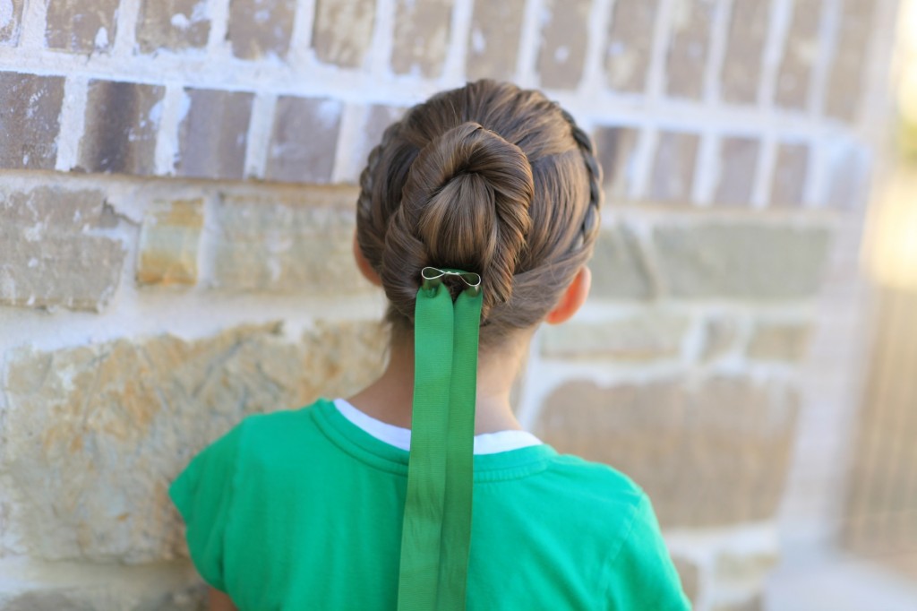 Young girl modeling Disney Frozen inspired Anna's Coronation Hairstyle 