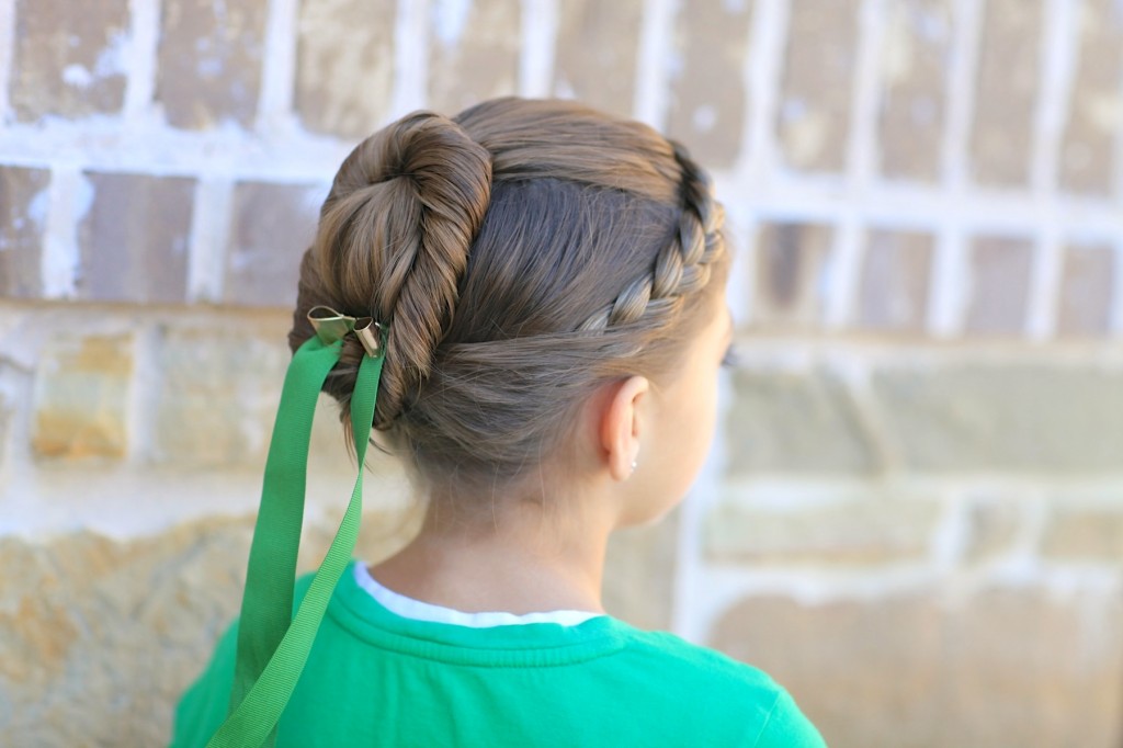 Young girl outside modeling Disney Frozen inspired Anna's Coronation Hairstyle 