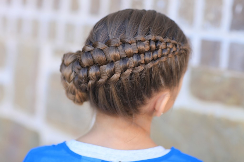 Little girl outside in a blue shirt modeling Zipper Braid | Updo Hairstyles