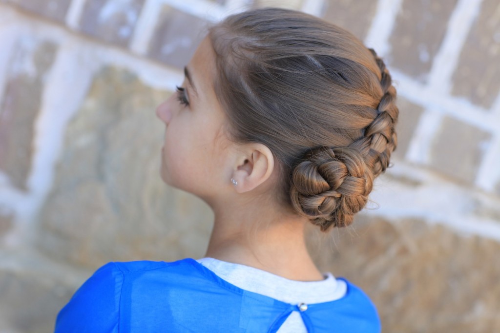 Little girl outside in a blue shirt modeling Zipper Braid | Updo Hairstyles