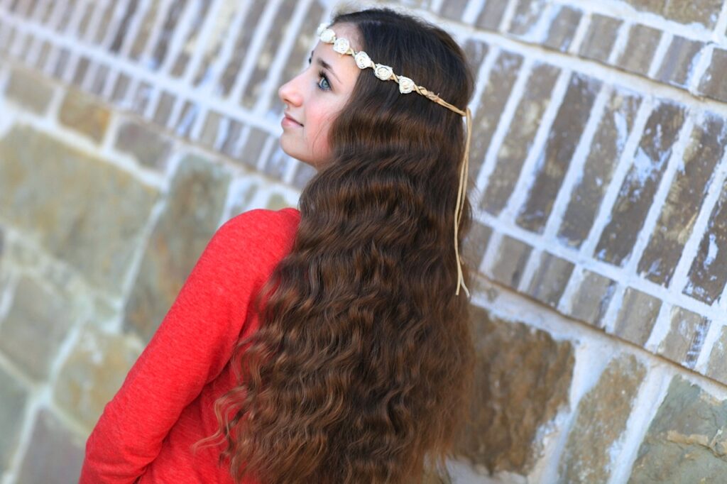 Young girl outside modeling No-Heat Bandana Curls