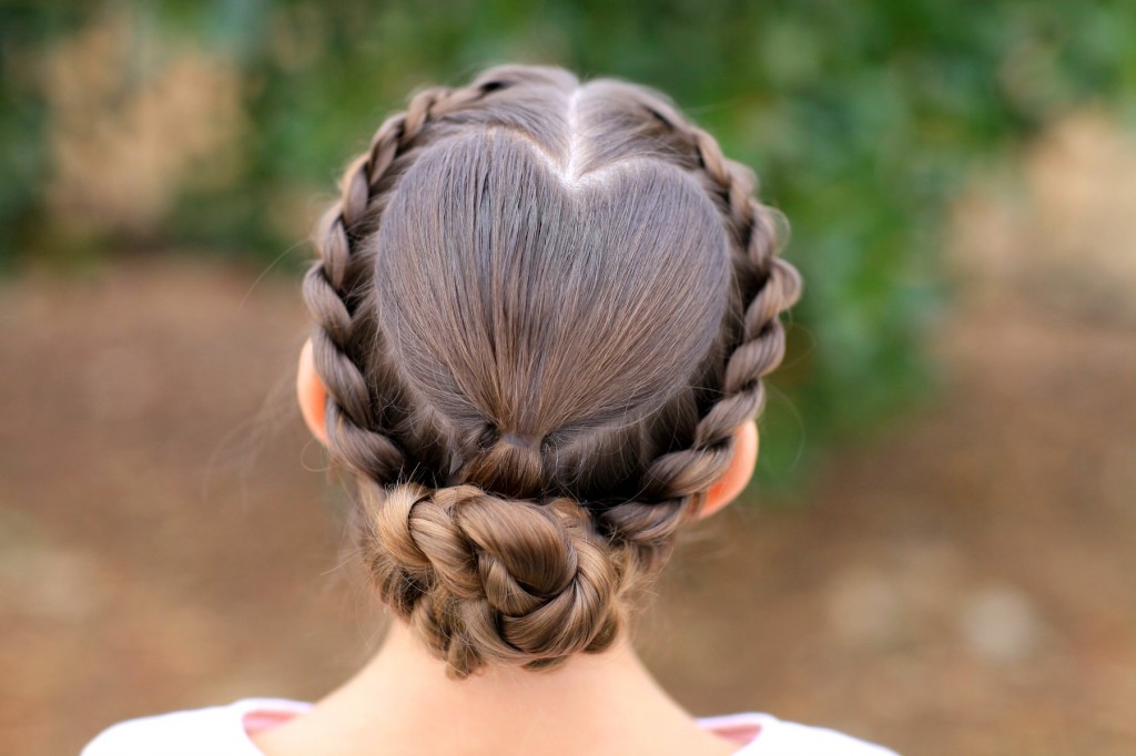 Young girl outside modeling Rope Twisted Heart | Valentine's Day Hairstyles