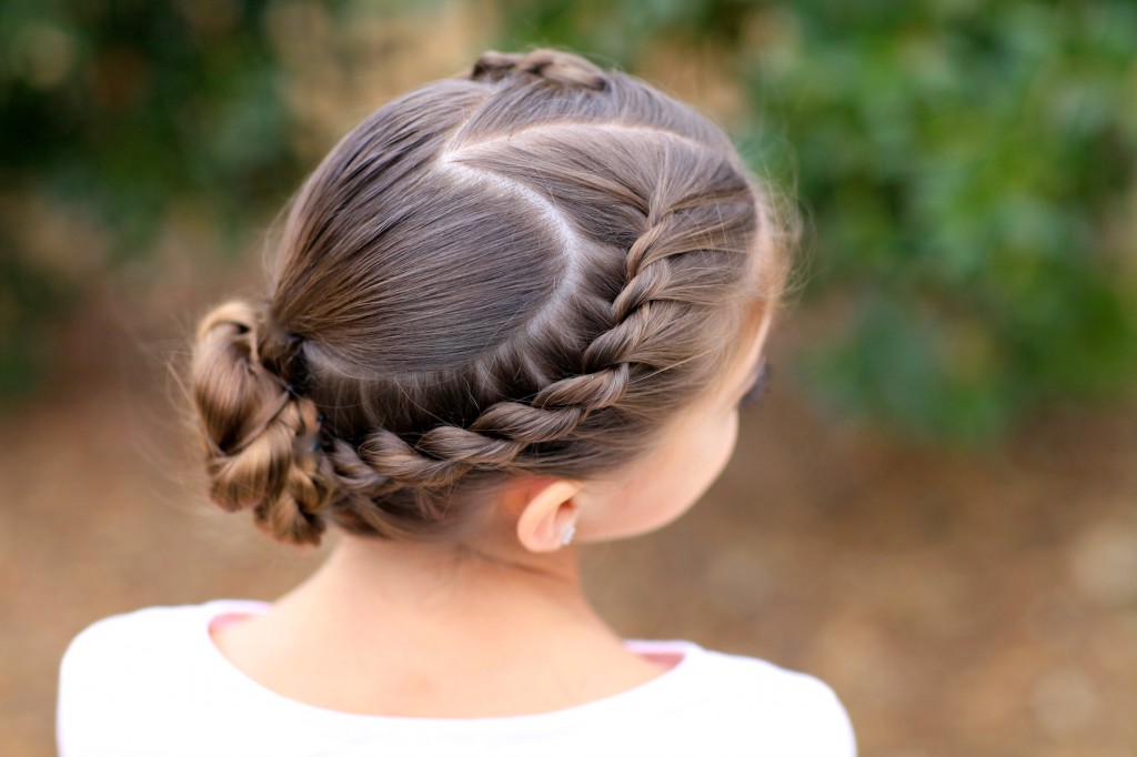 Young girl outside modeling Rope Twisted Heart | Valentine's Day Hairstyles