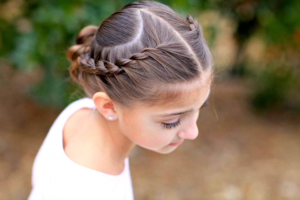 Young girl outside modeling Rope Twisted Heart | Valentine's Day Hairstyles