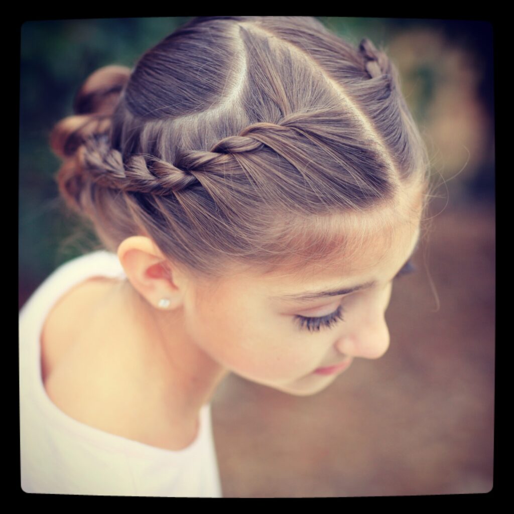 Young girl outside modeling Rope Twisted Heart | Valentine's Day Hairstyles