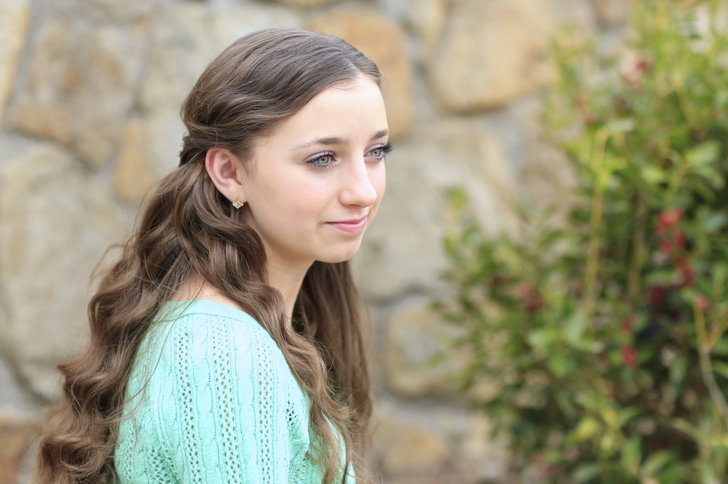 Young girl outside modeling Celtic Knot |St Patrick's Day Hairstyles