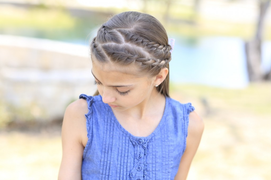 Young girl outside modeling Rope Braid Tieback Hairstyle