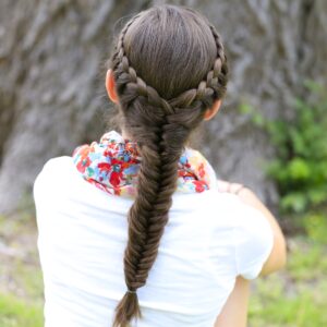 Young girl outside modeling Laced Fishtail Braid