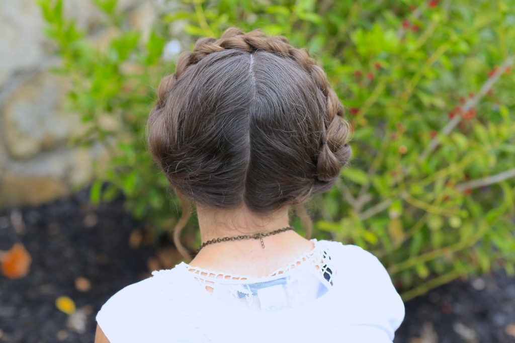 Young girl outside wearing a white shirt modeling Milkmaid Braids | Summer Hairstyles (Back)