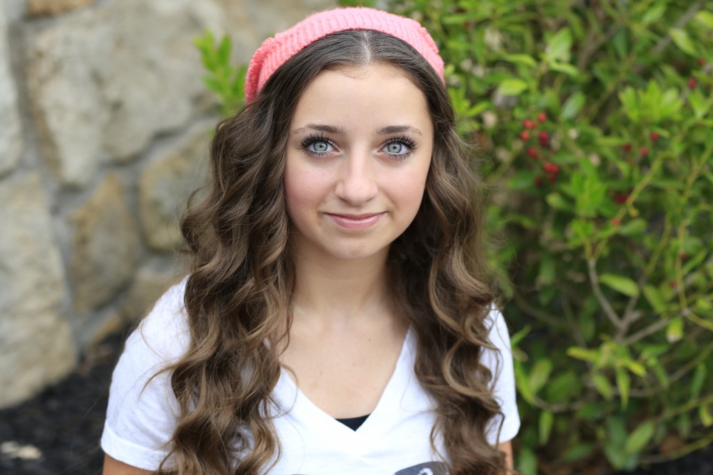 Young girl outside modeling Miner-Inspired Hair 