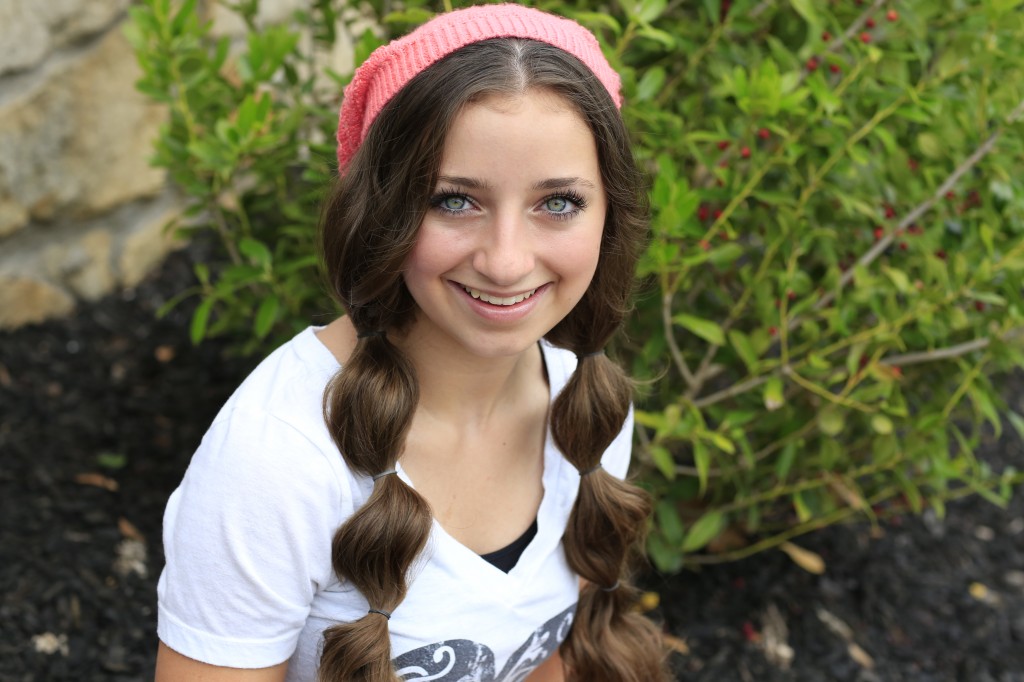 Young girl outside modeling Miner-Inspired Hair 