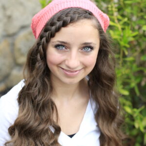 Young girl outside modeling Miner-Inspired Hair