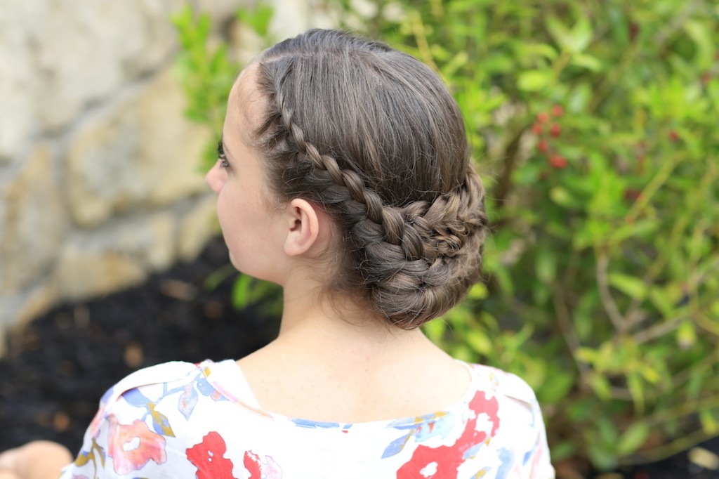 Young girl outside modeling Lace-Rolled Updo Hairstyle