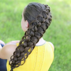 Young girl outside in a yellow shirt modeling "Diagonal French Loop Braid" hairstyle