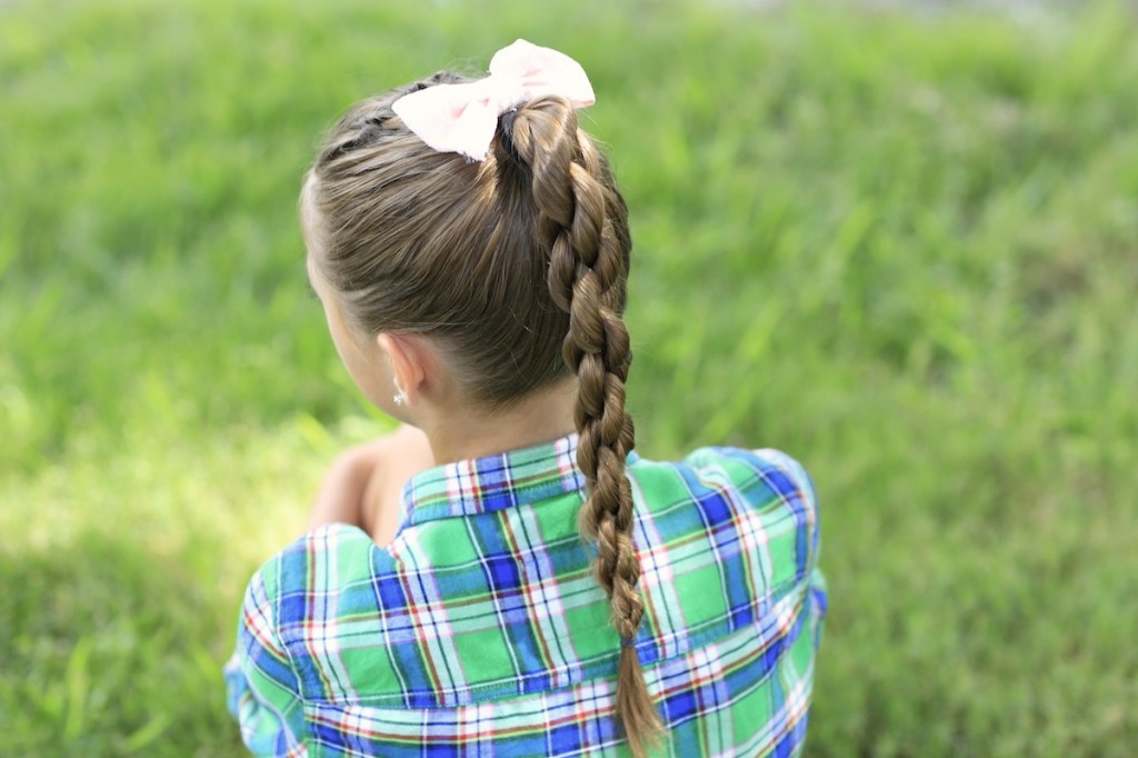 Little girl outside modeling Chain Link Braid