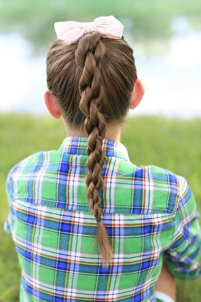 Little girl outside modeling Chain Link Braid