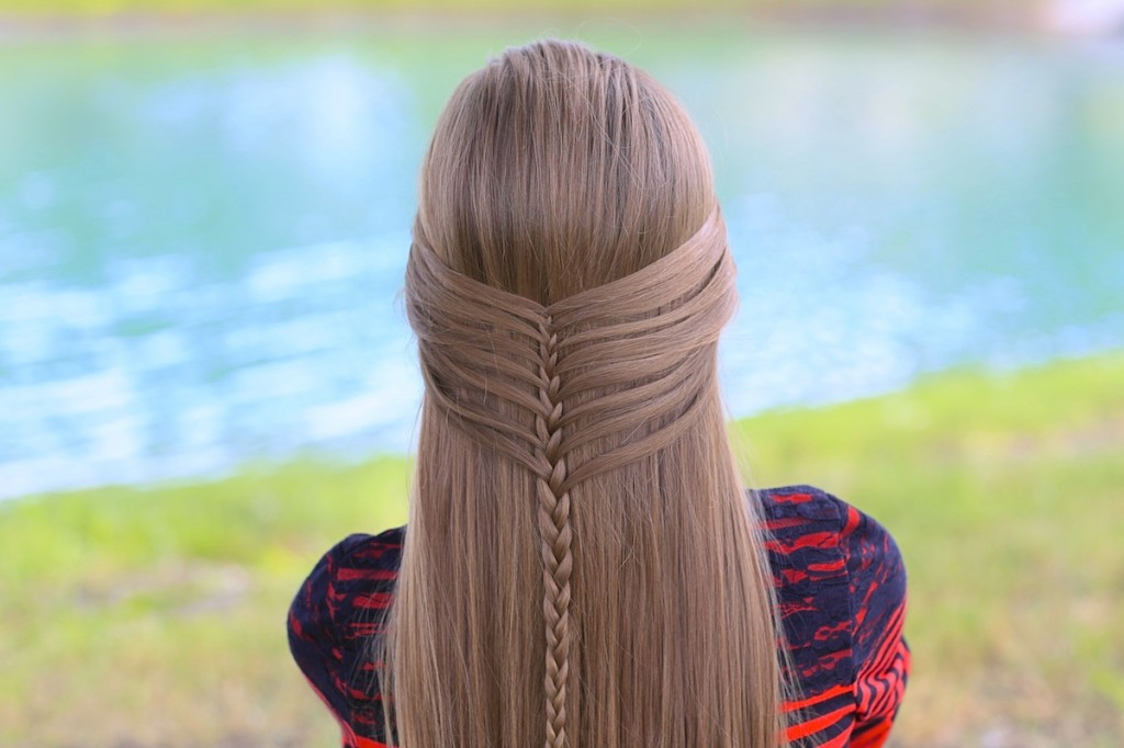 Young girl outside modeling Mermaid Half Braid | Hairstyles for Long Hair