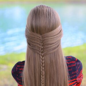 Young girl outside modeling Mermaid Half Braid | Hairstyles for Long Hair