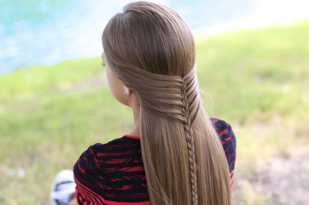 Young girl outside modeling Mermaid Half Braid | Hairstyles for Long Hair