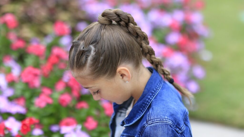 Little girl outside modeling Chain Link Braid