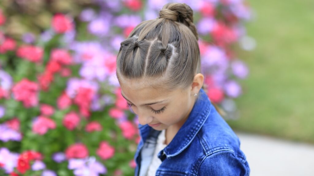 Little girl outside modeling Chain Link Braid