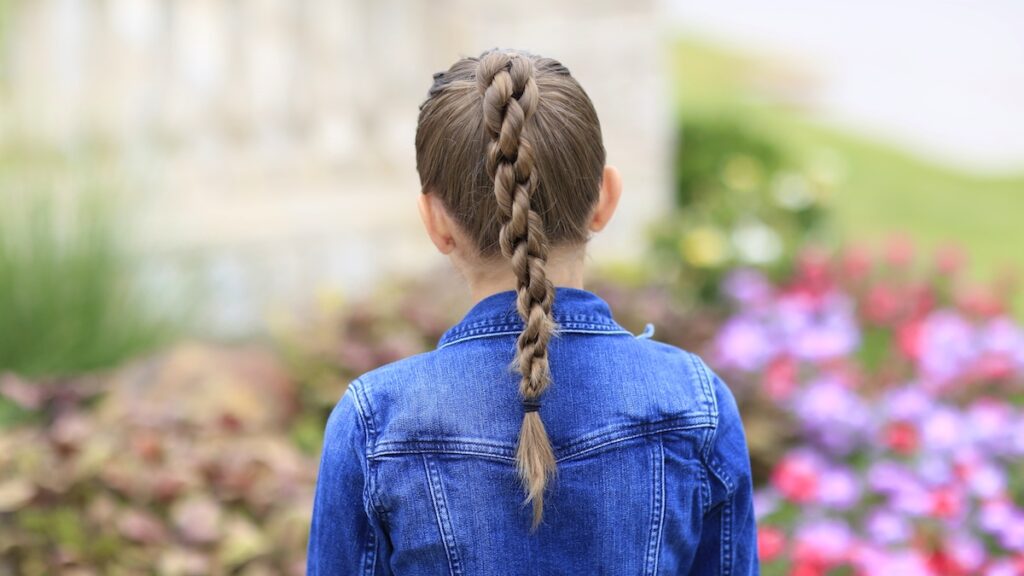 Little girl outside modeling Chain Link Braid