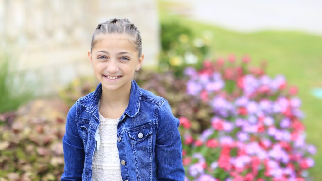 Little girl outside modeling Chain Link Braid